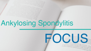 Photo illustration of blurred text with overlay that reads ankylosing spondylitis, focus.